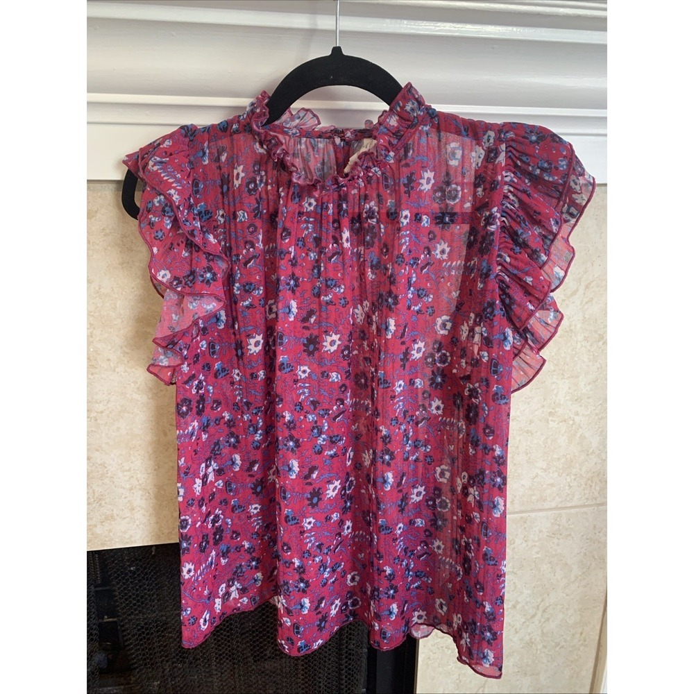 Anthropologie floral top, size small, with ruffled sleeves.